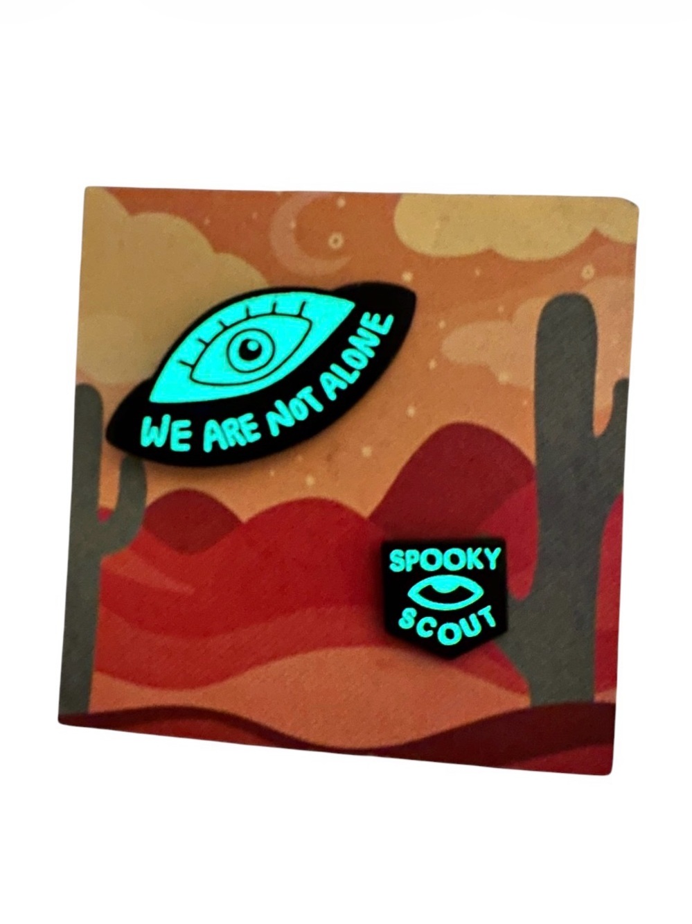 New Spooky Scouts Podcast Glow in the dark UFO Eye and Badge pin set